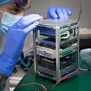 Scientist assembling computer